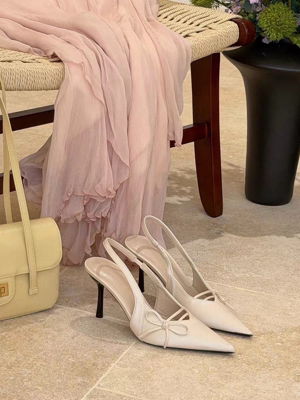 Elegant Cream Pointed Slingback Heels with Bow Detail